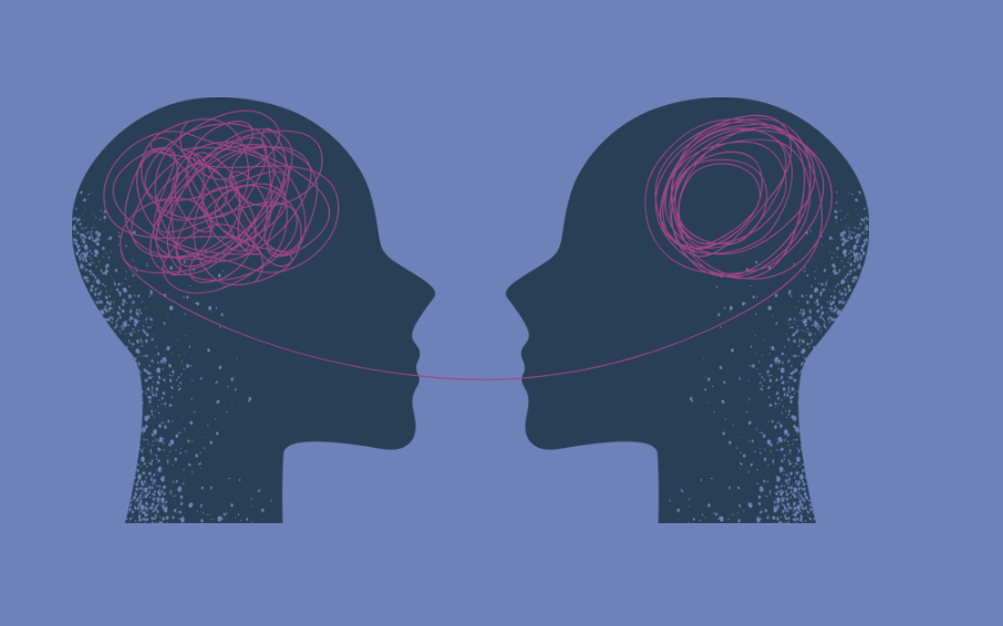 Two silhouettes of heads facing each other, connected by a thread, symbolizing the energy exchange in therapy.