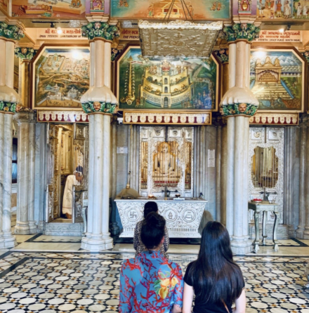 Devotees Offering Prayers in an Ornate Temple