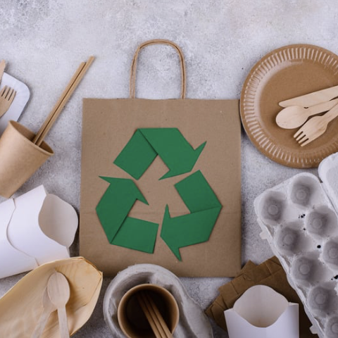 Sustainable products and recycling symbol, representing mindful living.